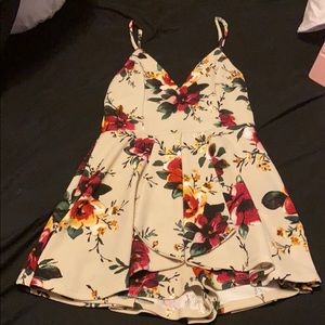 Nude colored dress with maroon flowers